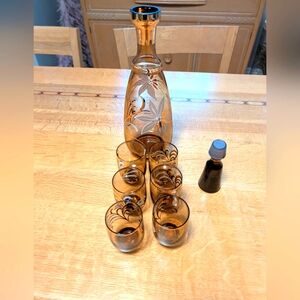 MCM liquor Decanter With White/Gold Floral Motif.